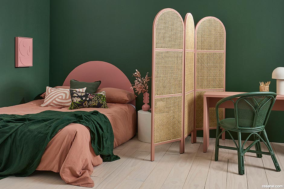 A forest green and terracotta pink bedroom